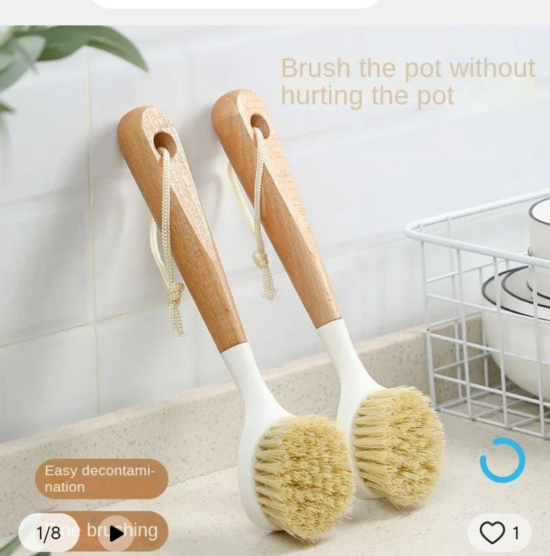 Kitchen /surface cleaning brush with wooden handle.