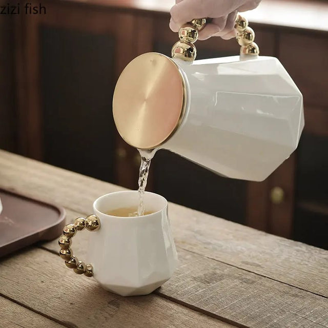 Luxurious tea set with golden handle
