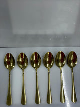 Six gold tea spoons l