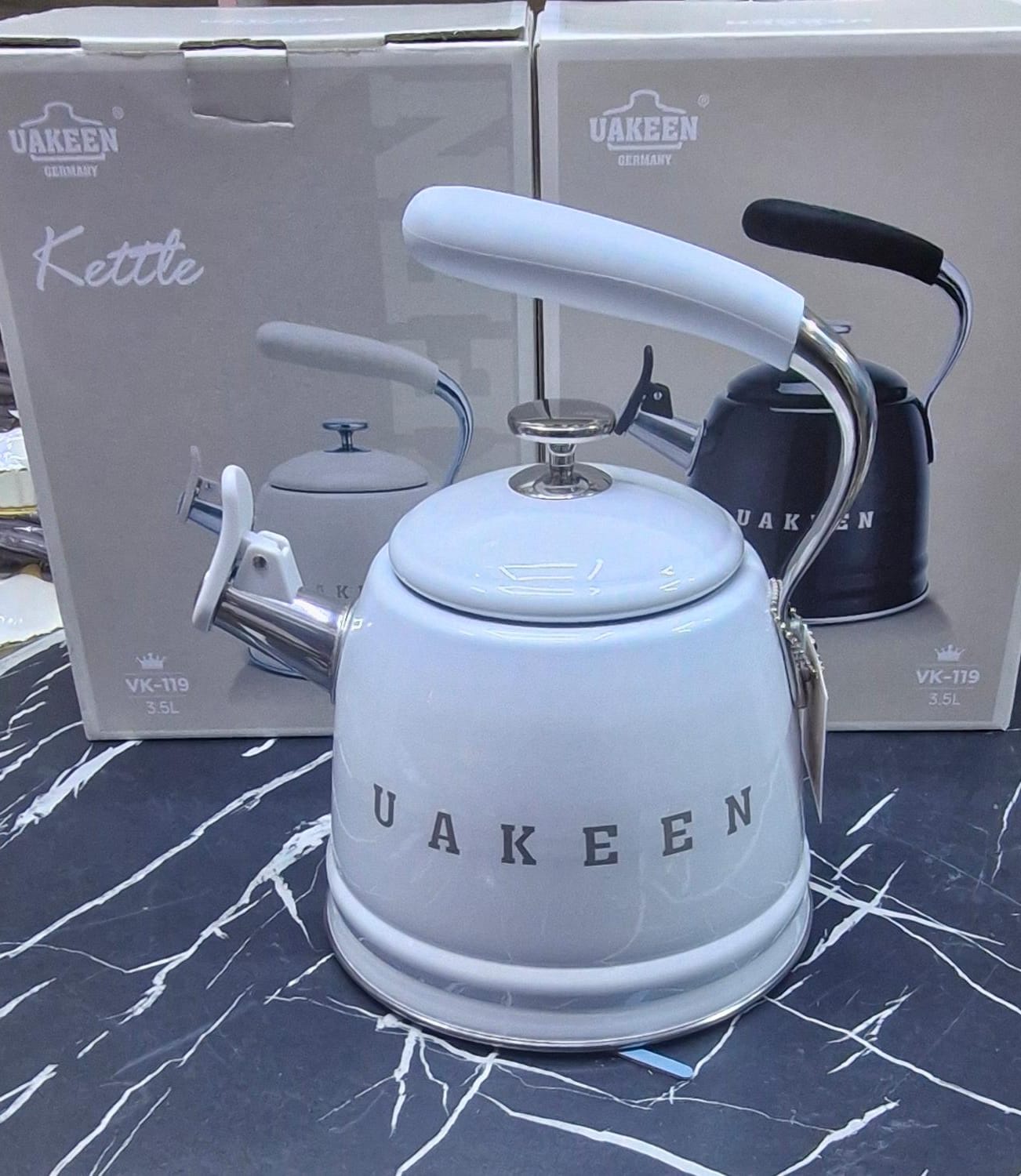 white UAKEEN Germany retro stovetop kettle in cream white with chrome handle and lid knob, available in cream, grey and navy blue
