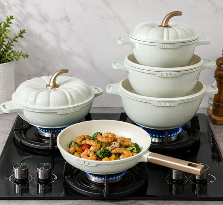 9-piece non-stick aluminium cookware set with three casserole pots, lids, and frying pan in a modern pumpkin design.