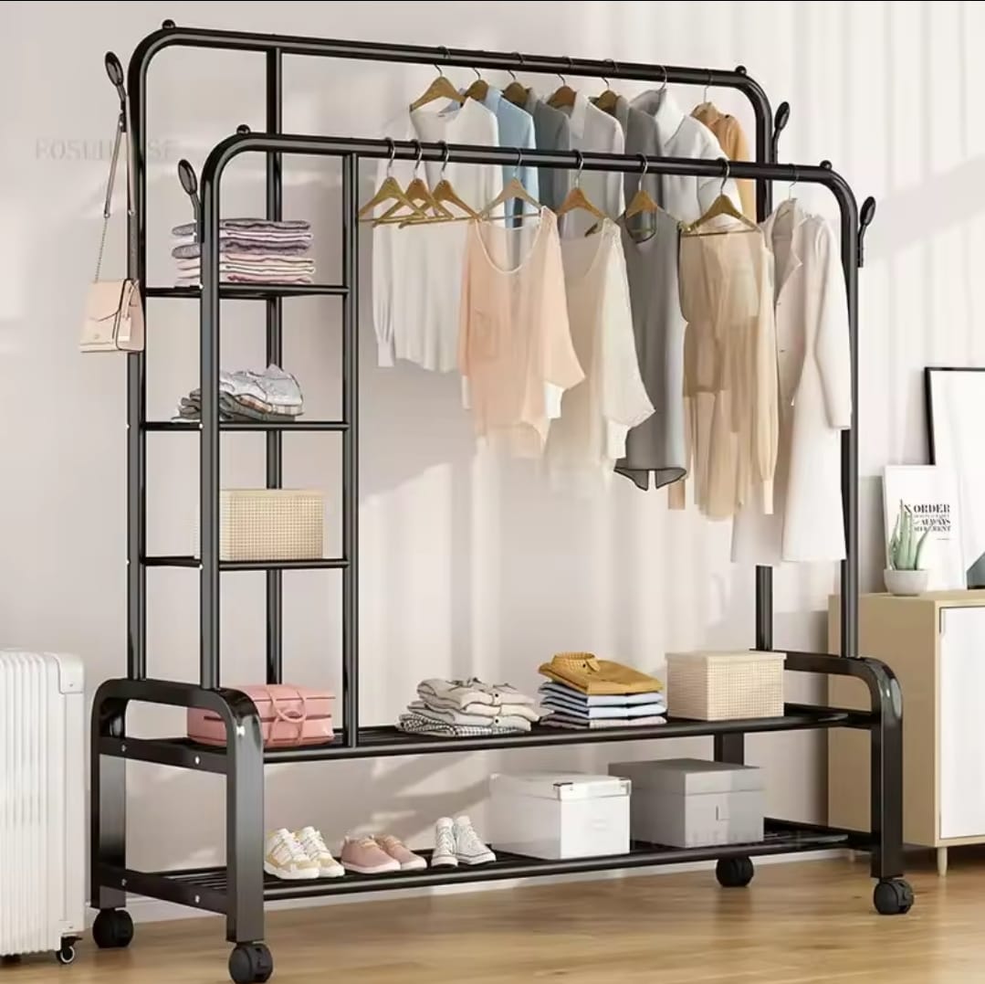 A double layer garment rack with clothes hangers, shelves with boxes and shoes, and a mobile rail. The rack is primarily black in color.