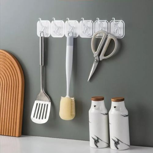 Wall-Mounted 6-Row Self-Adhesive Sticky Hook Set

Key Features:

Set includes 6 hooks in a single row – ideal for organized wall storage

Strong self-adhesive backing – no drilling or tools needed

Easily sticks to smooth surfaces like tiles, glass, metal, or wood

Perfect for hanging keys, kitchen tools, towels, or small accessories

Space-saving and minimalist design – suitable for home, kitchen, or bathroom use

Durable and water-resistant material for long-lasting use