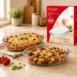 Two oval borosilicate glass bake pans for baking and serving meals, displayed on a modern kitchen countertop.