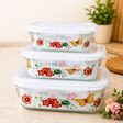 Three floral borosilicate glass food storage containers with airtight plastic lids in 400ml, 650ml, and 1000ml sizes.