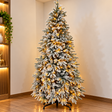Christmas tree flocked PVC prelit with warm white lights on metal stand — iDecorators Kenya