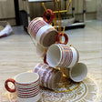 Buy ceramic tea cups set with holder in Kenya at a cheap price. Stylish 6pcs red design cups with free gold stand, durable and perfect for tea lovers. Available in Kenya with fast countrywide delivery.