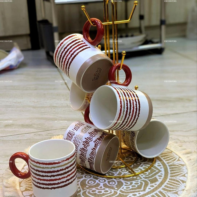 Buy ceramic tea cups set with holder in Kenya at a cheap price. Stylish 6pcs red design cups with free gold stand, durable and perfect for tea lovers. Available in Kenya with fast countrywide delivery.