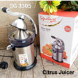 A silver citrus juicer with a manual hand crank, displayed next to its product box which has an image of the juicer and text indicating the model number SG 3305.