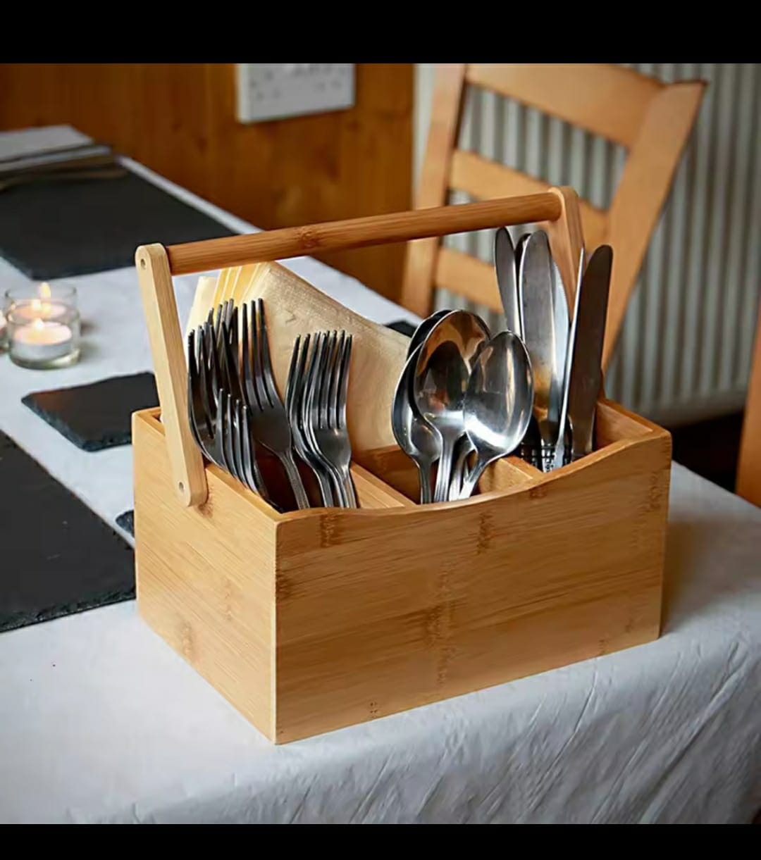 Portable countertop/kitchen cutlery organizer with handle.