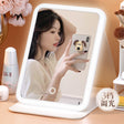 Rechargeable Travel Make-Up Mirror

Lighting: Three-color stepless dimming – warm, natural, and cold light

Design: No-frost, hard anti-scratch material

Battery: 2000mAh rechargeable battery

Stand: Adjustable stand

Mounting: Can be wall-mounted or placed on a surface