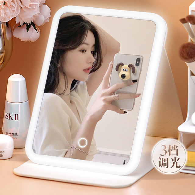 Rechargeable Travel Make-Up Mirror

Lighting: Three-color stepless dimming – warm, natural, and cold light

Design: No-frost, hard anti-scratch material

Battery: 2000mAh rechargeable battery

Stand: Adjustable stand

Mounting: Can be wall-mounted or placed on a surface