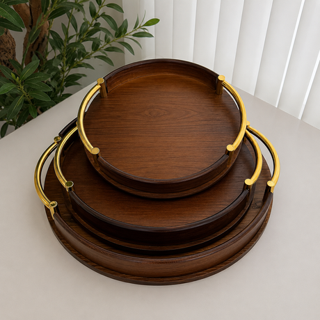 Set of 3 round wooden serving trays with gold metal handles, perfect for serving food, drinks, coffee, tea, and home décor in kitchens, dining rooms, and living spaces.