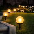 Solar garden lights frosted globe warm light lawn pathway — iDecorators Kenya