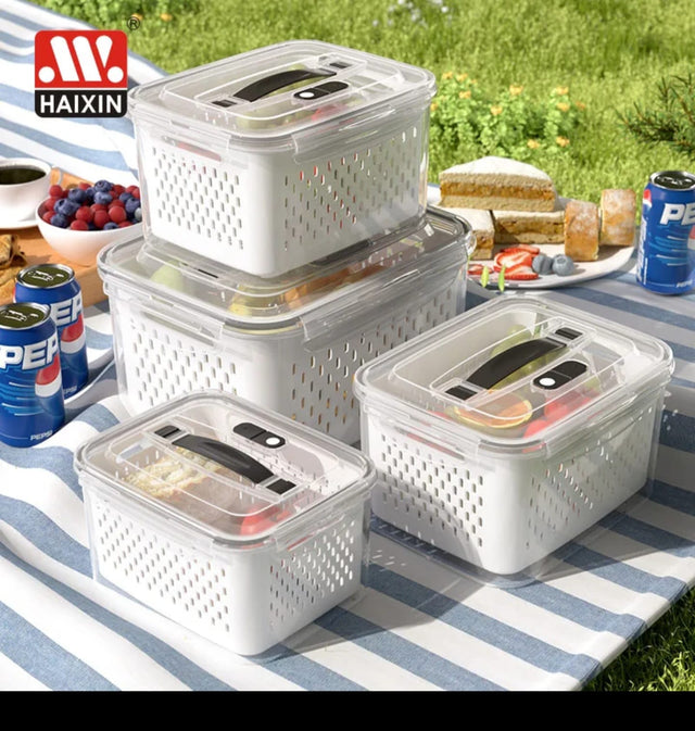 4-piece clear airtight food storage container set with removable drain baskets and lids in 800ml, 1700ml, 3150ml and 4150ml sizes