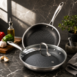 Uakeen 28cm triply stainless steel honeycomb frying pan with tempered glass lid and 2.7L capacity.