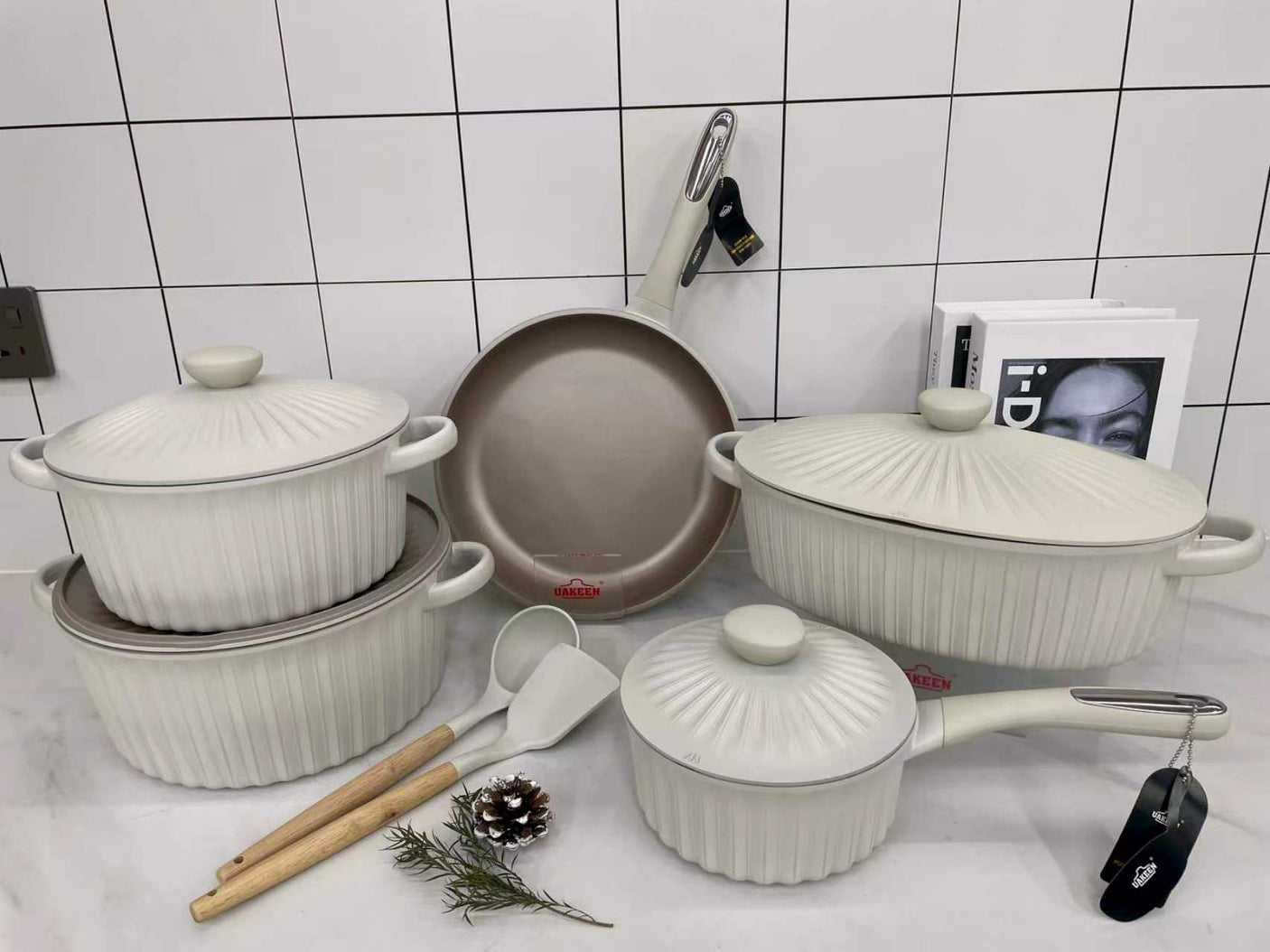 UAKEEN 10-piece cream non-stick cookware set with ribbed granite-coated pots, frying pan, saucepan, casserole dish with lids and cooking utensils
