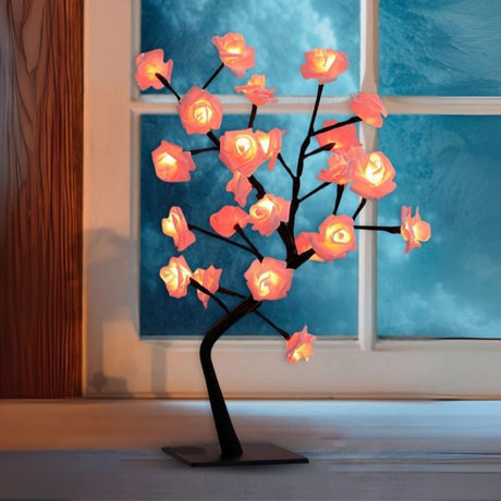 Cherry Blossom Bonsai Tree Lamp

Design: Delicately crafted to mimic a blooming bonsai tree with soft cherry blossom petals.

Lighting: Emits a romantic 100LM warm glow, perfect for mood lighting.

Portability: USB operated, lightweight, and easy to move around – ideal for both indoor and outdoor use.

Use Cases: Great for gardens, bedrooms, office desks, or as a unique gift.

Material: Durable plastic with flexible branches you can shape to your liking.