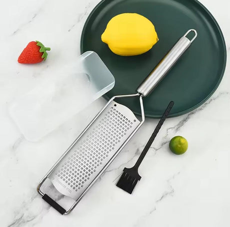 Premium stainless steel fine grater with protective cover and cleaning brush for grating cheese, lemon zest, garlic, ginger, chocolate, and spices.