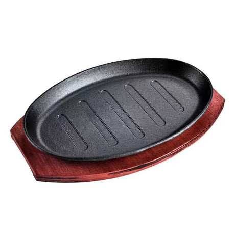 Sizzling plate with wooden base