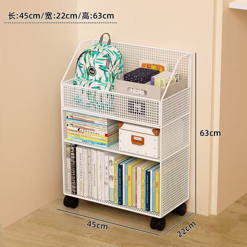 3-tier black and white metal mesh rolling bookshelf measuring 45cm long by 22cm wide by 63cm tall, with deep top basket holding a school backpack, middle shelf with books and storage box, bottom shelf with upright books, on lockable wheels — mobile study storage rack available at iDecorators Kenya, Nairobi.