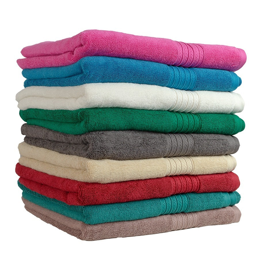 A stack of folded towels in various colors including pink, blue, white, green, beige, red, and gray.