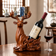 Decorative resin deer wine bottle holder with a wood-look finish displaying a standard wine bottle on a wooden table.