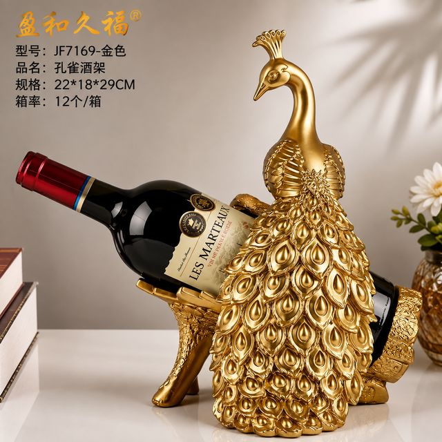 Gold resin peacock wine bottle holder displaying a standard wine bottle on a tabletop.