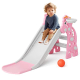 Pink and white plastic toddler slide for kids aged 1.5 to 3 years, with a smooth sliding surface, extended pink landing base, mini basketball hoop, climbing pegs, and a basketball included — indoor children's play set available at iDecorators KeNYA